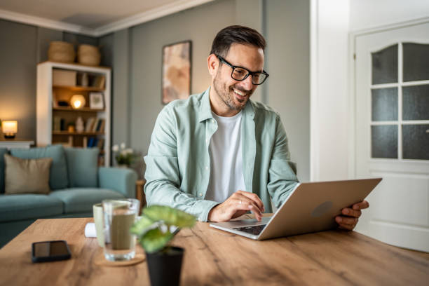 Man completing a medical intake questionnaire at home